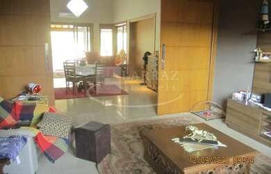 Imagem: A casa possui 4 Dormitórios, 4 Suítes, 7 Banheiros, 6 Vagas