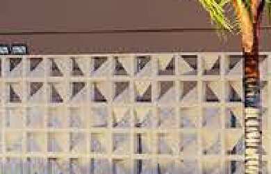 Imagem: O apartamento possui 2 Dormitórios, 1 Suíte, 2 Banheiros