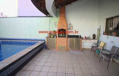 Imagem: A casa possui 4 Dormitórios, 4 Suítes, 5 Banheiros, 6 Vagas