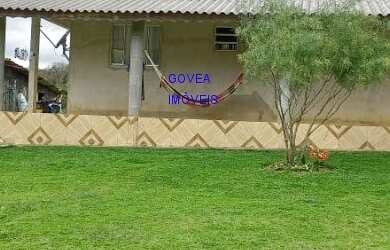 Imagem: A chácara possui 3 Dormitórios, 1 Banheiro, 2 Vagas na garagem