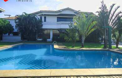 Imagem: A casa possui 4 Dormitórios, 4 Suítes, 10 Vagas na garagem