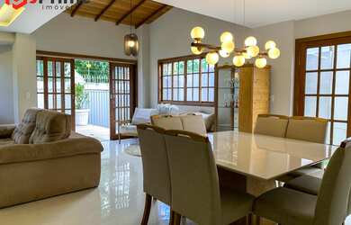 Imagem: A casa possui 5 Dormitórios, 3 Suítes, 5 Banheiros, 5 Vagas