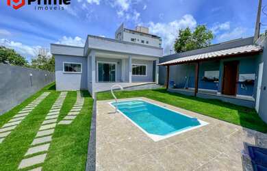 Imagem: A casa possui 3 Dormitórios, 1 Suíte, 3 Banheiros, 2 Vagas