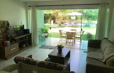 Imagem: A casa em condomínio possui 4 Dormitórios, 4 Suítes, 5 Banheiros