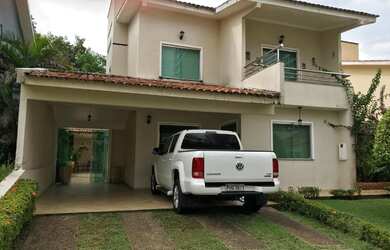 Imagem: A casa possui 4 Dormitórios, 4 Suítes, 4 Vagas na garagem