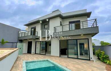 Imagem: A casa em condomínio possui 4 Dormitórios, 4 Suítes, 4 Vagas