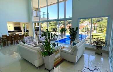 Imagem: A casa em condomínio possui 6 Dormitórios, 6 Suítes, 9 Banheiros