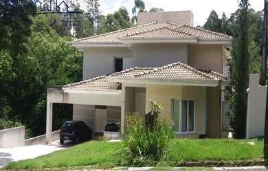 Imagem: A casa em condomínio possui 4 Dormitórios, 4 Suítes, 7 Banheiros