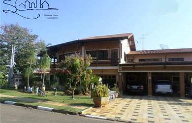 Imagem: A casa em condomínio possui 7 Dormitórios, 5 Suítes, 6 Vagas