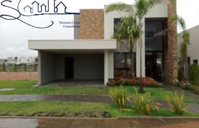 Imagem: A casa possui 3 Dormitórios, 3 Suítes, 5 Banheiros, 4 Vagas