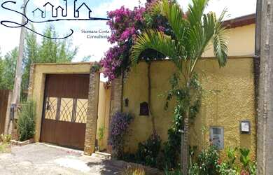 Imagem: A casa possui 3 Dormitórios, 3 Suítes, 5 Banheiros, 4 Vagas