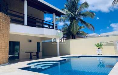 Imagem: A casa em condomínio possui 4 Dormitórios, 4 Suítes, 5 Banheiros