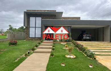 Imagem: A casa possui 4 Dormitórios, 1 Suíte, 4 Banheiros, 5 Vagas