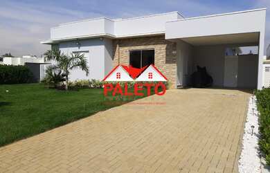 Imagem: A casa em condomínio possui 3 Dormitórios, 3 Suítes, 4 Banheiros