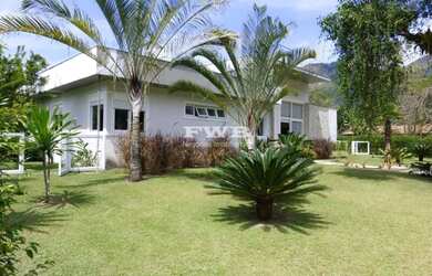 Imagem: A casa em condomínio possui 6 Dormitórios, 6 Suítes, 7 Banheiros