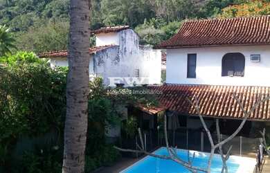 Imagem: A casa em condomínio possui 4 Dormitórios, 4 Suítes, 4 Vagas