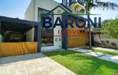 Imagem: A casa possui 5 Dormitórios, 5 Suítes, 7 Banheiros, 5 Vagas