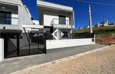 Imagem: A casa possui 3 Dormitórios, 1 Suíte, 2 Banheiros, 2 Vagas