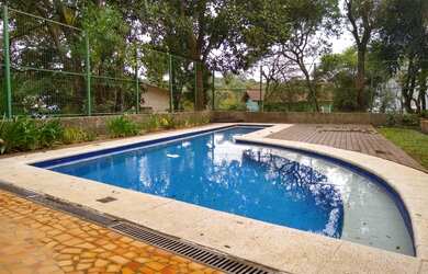 Imagem: A casa possui 5 Dormitórios, 3 Suítes, 6 Banheiros, 8 Vagas