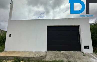 Imagem: A casa possui 2 Dormitórios, 1 Banheiro, 2 Vagas na garagem