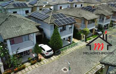 Imagem: A casa possui 2 Dormitórios, 2 Suítes, 3 Banheiros, 2 Vagas