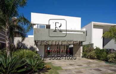 Imagem: A casa em condomínio possui 5 Dormitórios, 5 Suítes, 1 Banheiro