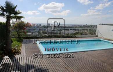 Imagem: A casa possui 4 Dormitórios, 2 Banheiros, 6 Vagas na garagem