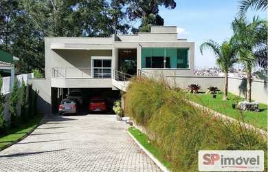 Imagem: A casa possui 6 Dormitórios, 3 Suítes, 7 Banheiros, 16 Vagas