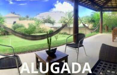 Imagem: A casa em condomínio possui 4 Dormitórios, 4 Suítes, 2 Vagas