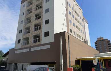 Imagem: O apartamento possui 2 Dormitórios, 1 Suíte, 2 Banheiros