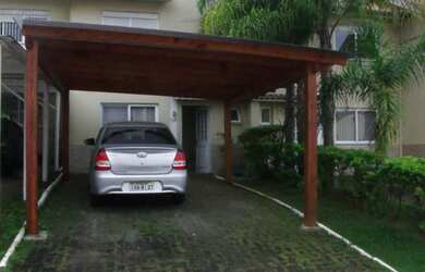 Imagem: A casa em condomínio possui 2 Dormitórios, 2 Banheiros, 1