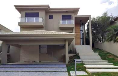 Imagem: A casa em condomínio possui 4 Dormitórios, 4 Suítes, 6 Banheiros