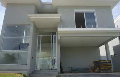 Imagem: A casa em condomínio possui 5 Dormitórios, 5 Suítes, 7 Banheiros