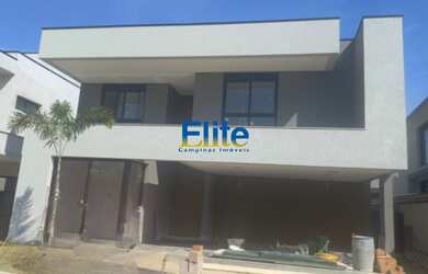 Imagem: A casa em condomínio possui 4 Dormitórios, 4 Suítes, 6 Banheiros