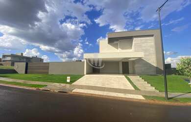 Imagem: A casa em condomínio possui 4 Dormitórios, 4 Suítes, 6 Banheiros