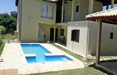 Imagem: A casa em condomínio possui 6 Dormitórios, 4 Suítes, 7 Banheiros