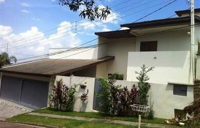 Imagem: A casa em condomínio possui 4 Dormitórios, 3 Suítes, 5 Banheiros