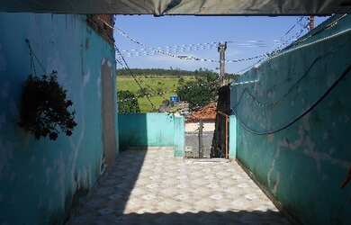 Imagem: A casa possui 2 Dormitórios, 1 Banheiro, 1 Vaga na garagem