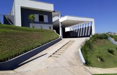 Imagem: A casa em condomínio possui 3 Dormitórios, 3 Suítes, 4 Banheiros