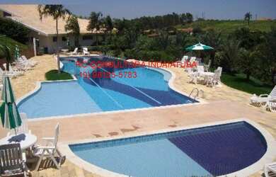 Imagem: O terreno possui 3 Dormitórios, 3 Suítes, 5 Banheiros, 4 Vagas