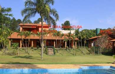 Imagem: A chácara possui 4 Dormitórios, 1 Suíte, 4 Banheiros, 5 Vagas