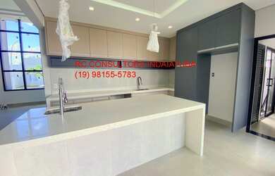 Imagem: O terreno possui 3 Dormitórios, 3 Suítes, 5 Banheiros, 2 Vagas