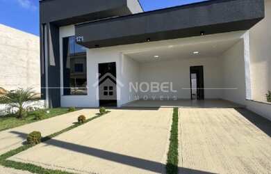 Imagem: A casa possui 3 Dormitórios, 3 Suítes, 4 Vagas na garagem