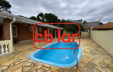 Imagem: A chácara possui 2 Dormitórios, 1 Banheiro, 2 Vagas na garagem