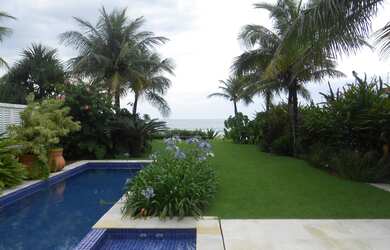 Imagem: A casa em condomínio possui 5 Dormitórios, 5 Suítes, 6 Banheiros