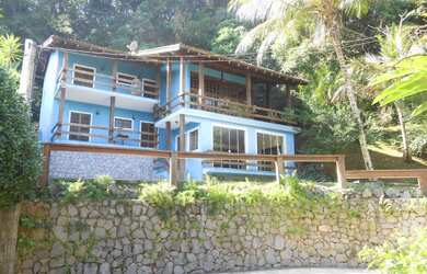 Imagem: A casa em condomínio possui 7 Dormitórios, 5 Suítes, 7 Banheiros