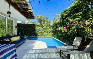 Imagem: A casa em condomínio possui 4 Dormitórios, 4 Suítes, 2 Vagas