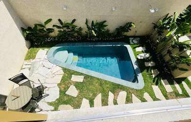 Imagem: A casa em condomínio possui 5 Dormitórios, 5 Suítes, 6 Banheiros