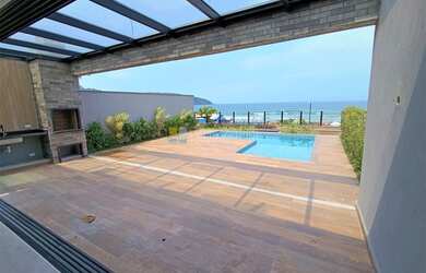 Imagem: A casa em condomínio possui 4 Dormitórios, 4 Suítes, 5 Banheiros