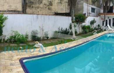 Imagem: A casa possui 4 Dormitórios, 1 Suíte, 3 Banheiros, 5 Vagas